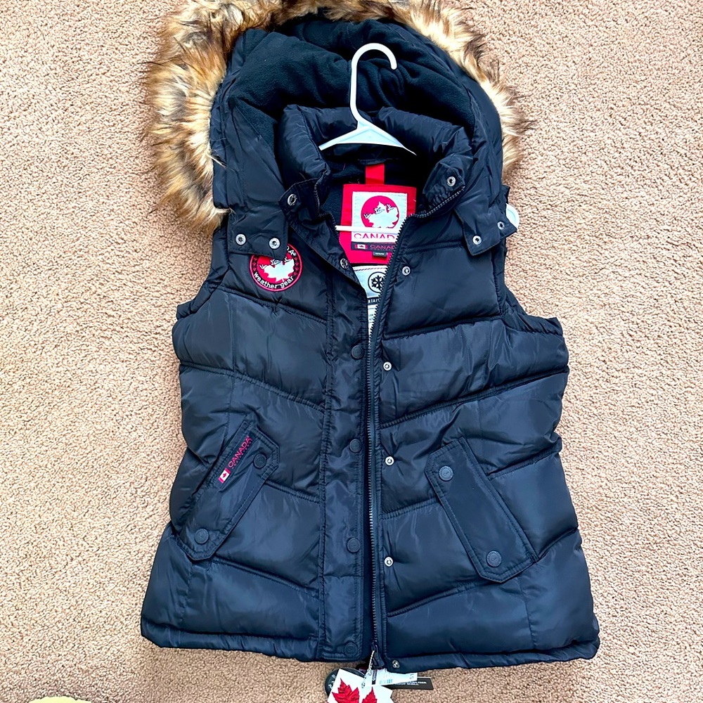 New with tags, amazing puffer vest and warm!